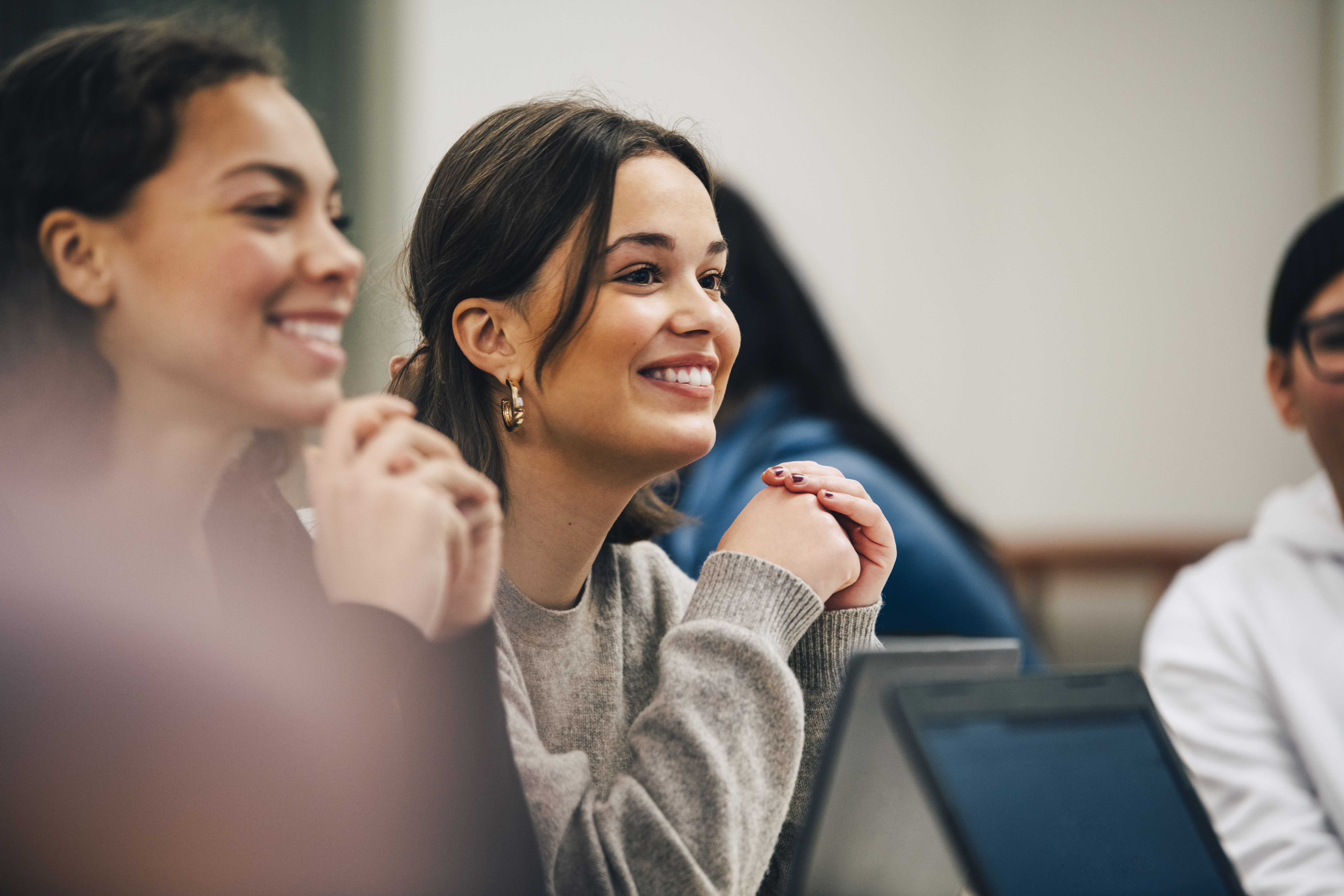 students smiling during lesson