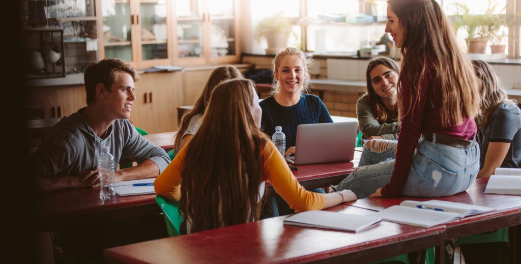 students chatting during break in class