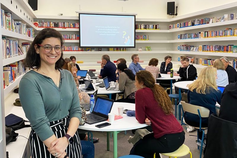 photograph of teacher in a classroom